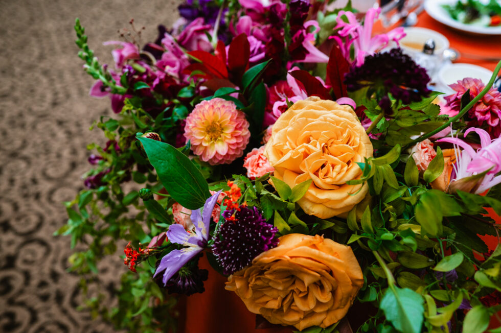 orange purple and green floral bridal bouquet average wedding cost maryland