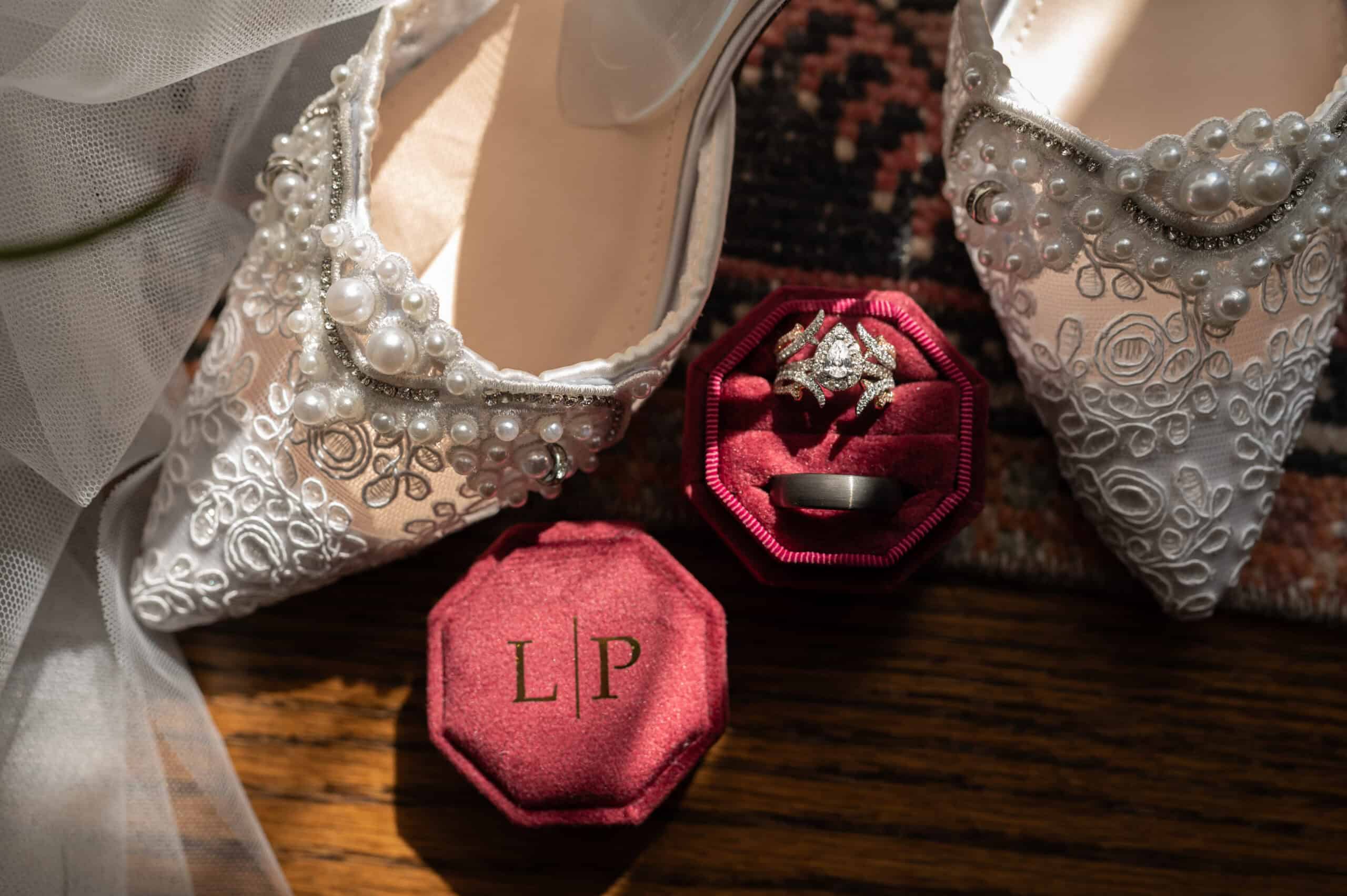 pearl wedding shoes and rings in box wedding photography in maryland