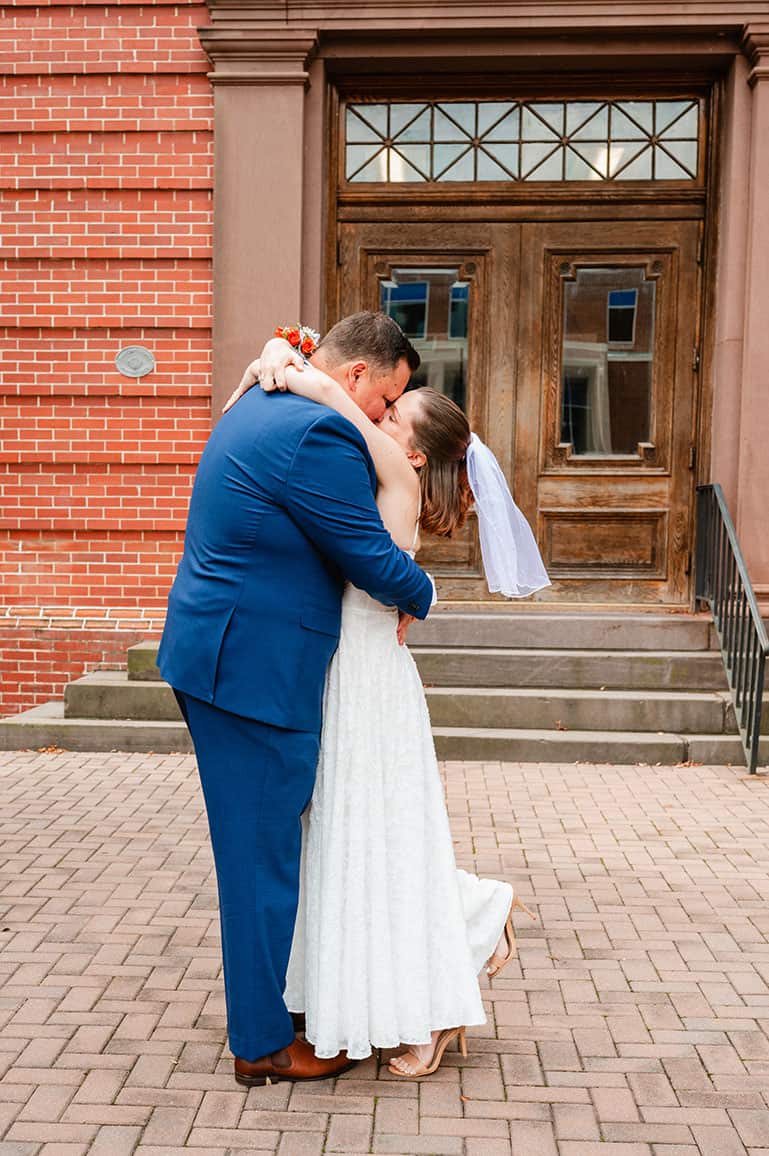 bride and groom kissing